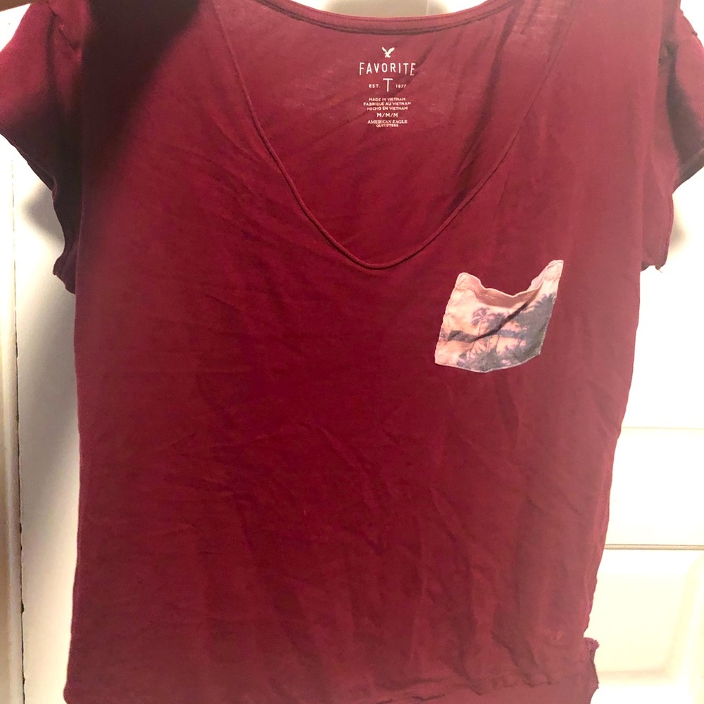 T-shirt, maroon, pink pocket on front
